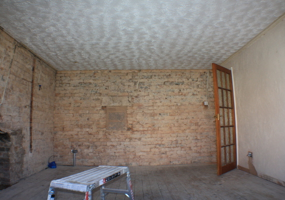 The walls were striped back to brick and ceilings taken down. As the ceiling had sagged due to the joists being cut during a past loft conversion and they needed reinforcing.